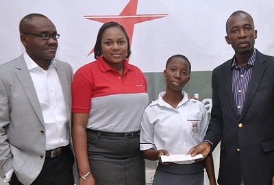 L-r: Victor Ukwat, DGM Sales, (Mrs.) Amaka Okeke, Adebayo Temitope Red Star scholar and Sola Obabori, COO Red Star Logistics during the fund presentation ceremony held in honour of recipients of the scholarship award in Lagos recently.